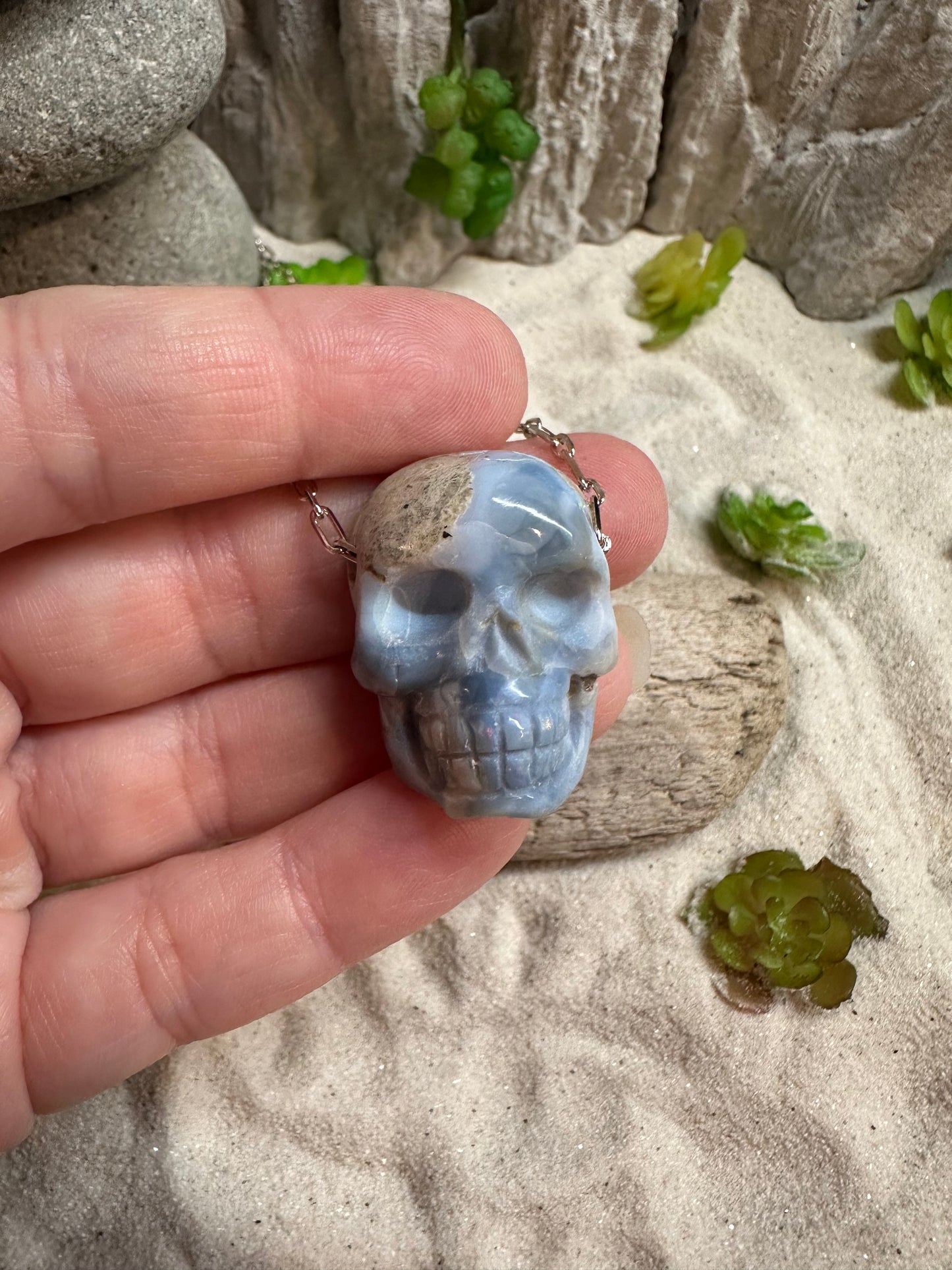 Carved Mexican Fire Opal Skull